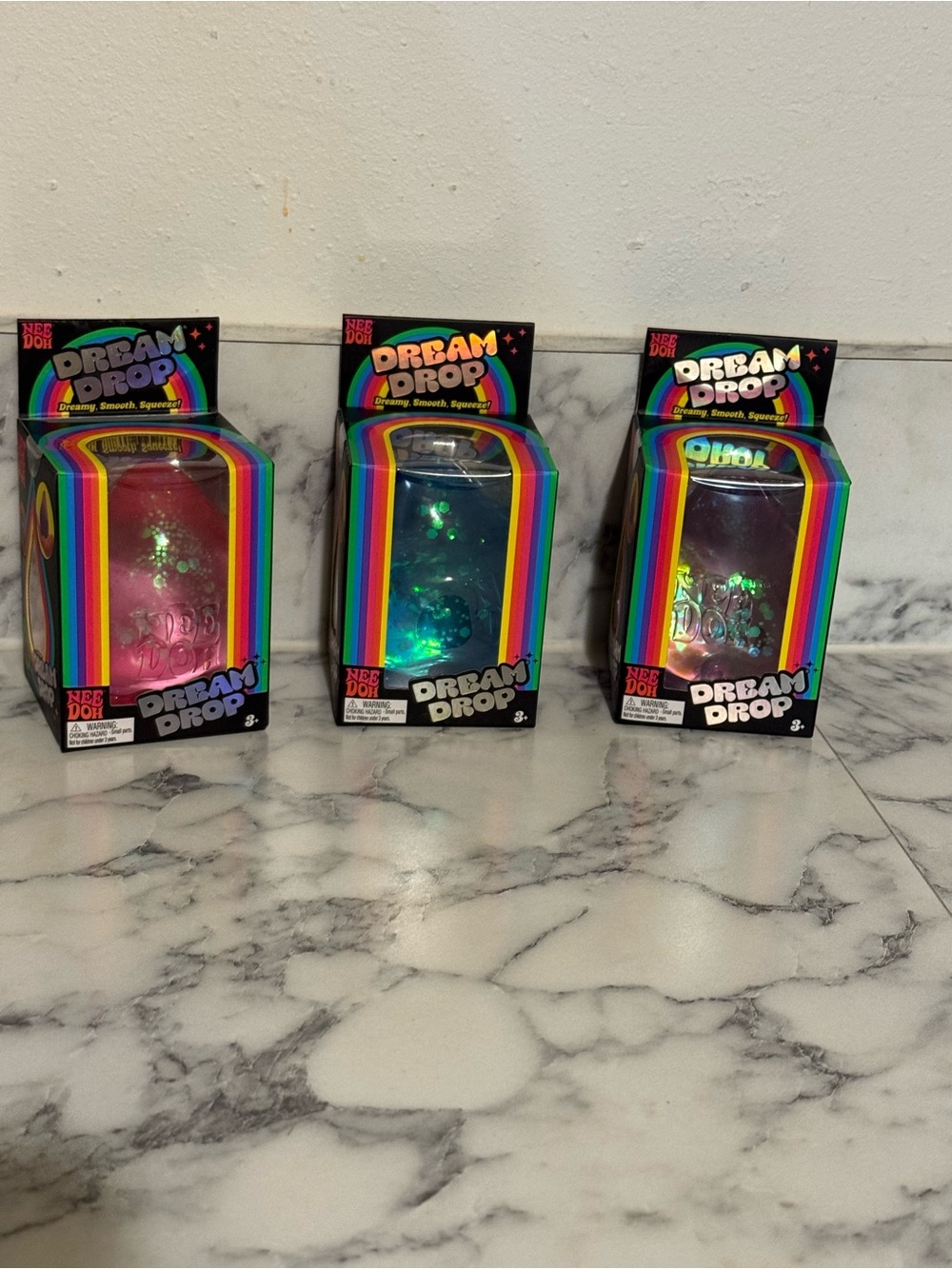 Nee doh dream drop lot of 3 - pink, blue & purple